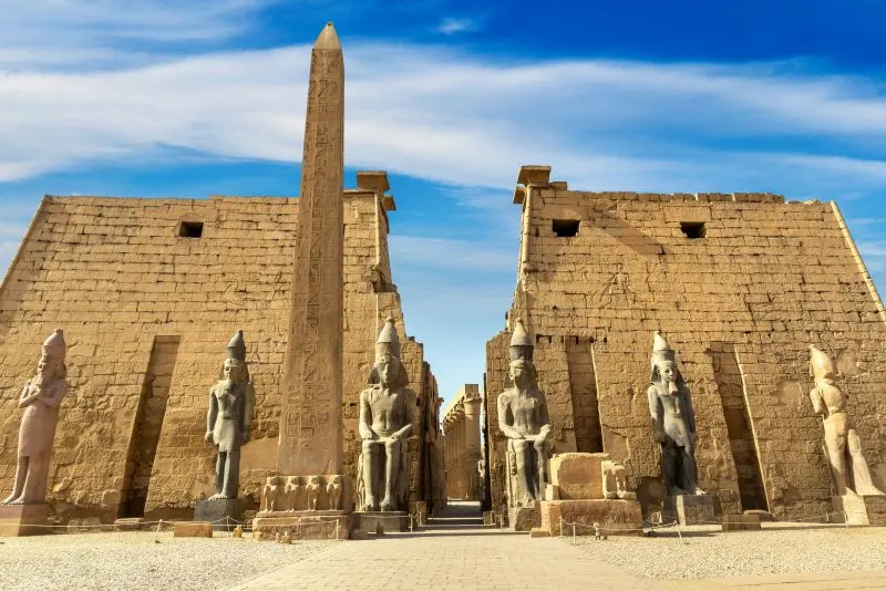 Walking through Luxor Temple during 8-day Easter Trip: Cairo and Nile Cruise